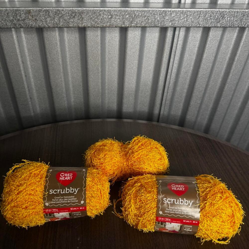 Bundle of yellow scrubby stripes yarn